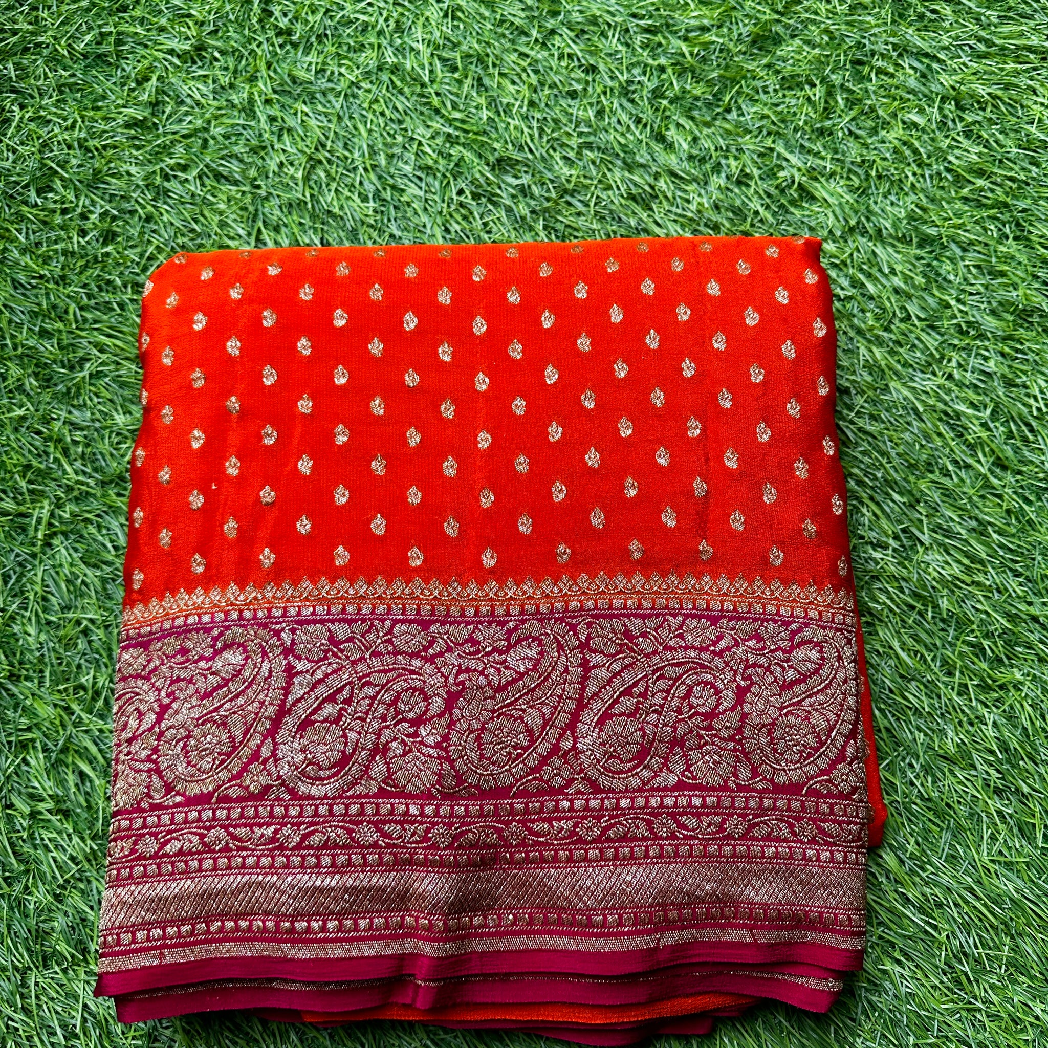 Pure crape silk. Orange with pink.