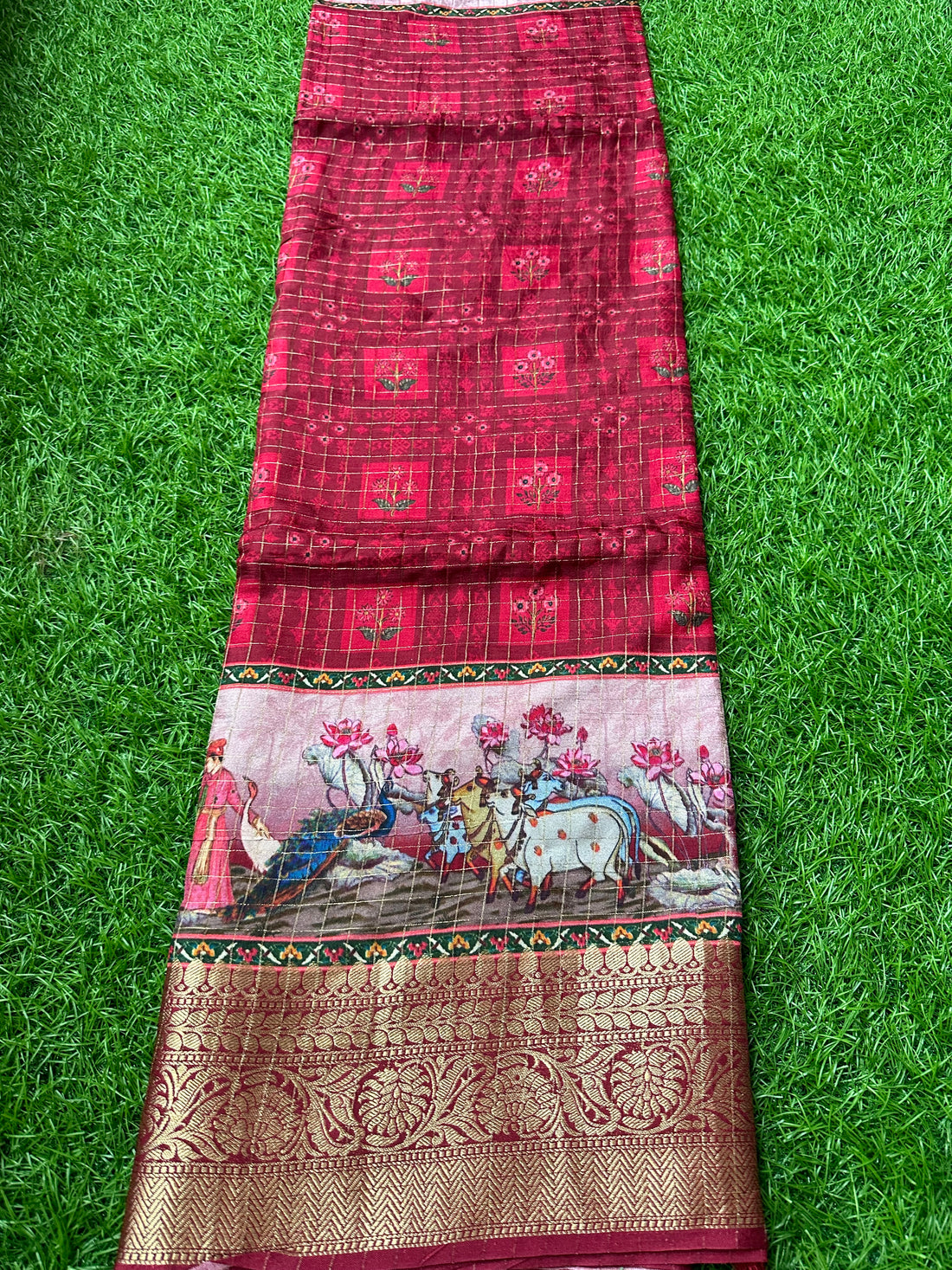 Maroon dola crepe with kalamkari border.