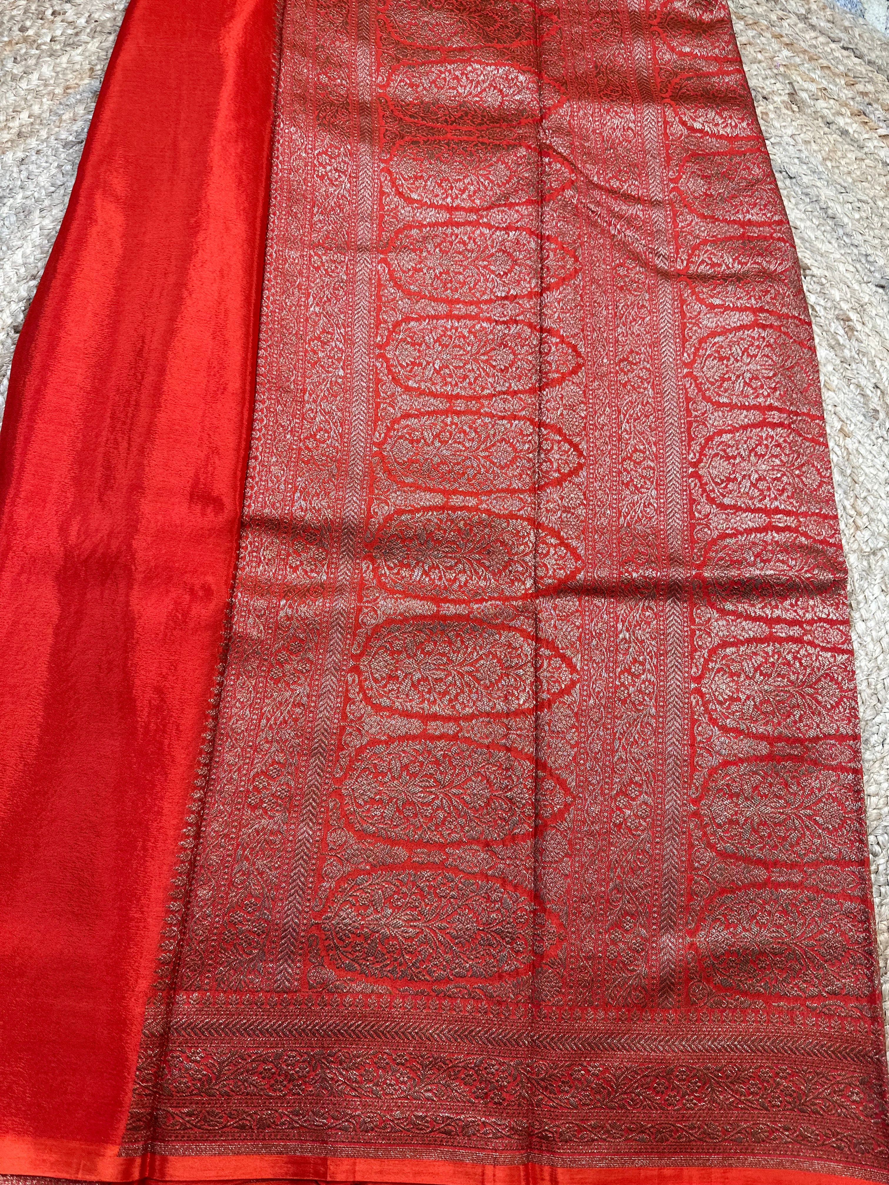 Orange brocade crepe chiffon sarees.