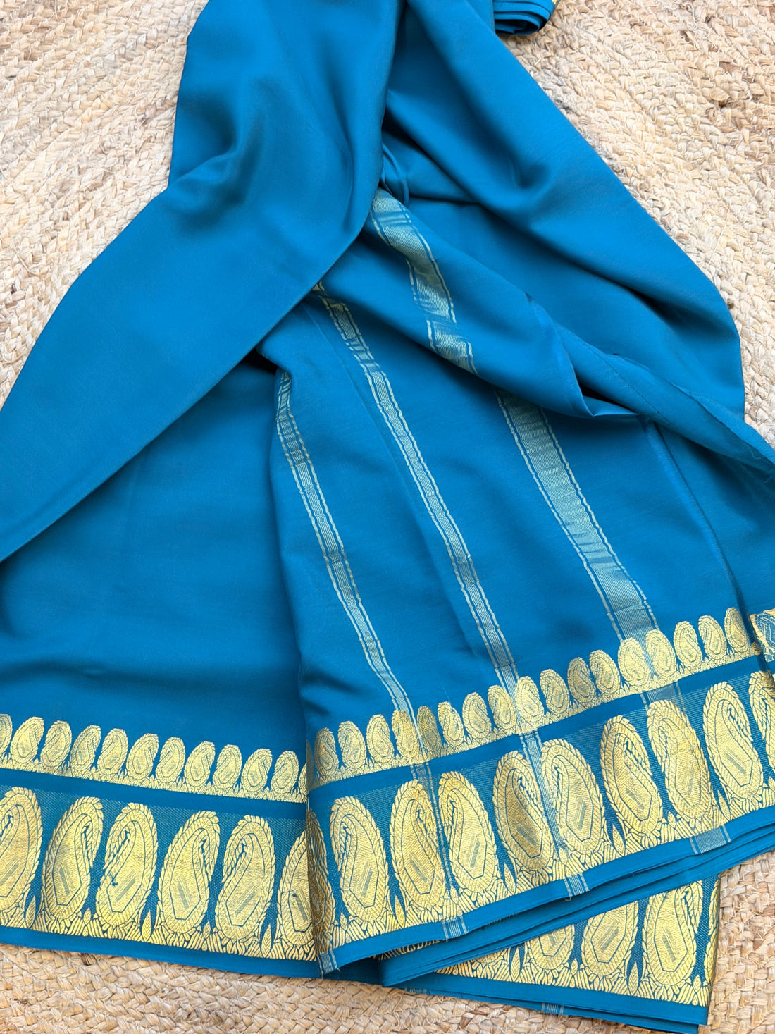 Peacock blue KSIC double mango border crepe Mysore silk 120gsm