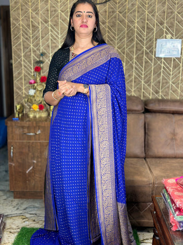 Royal blue pure khaddi Georgette sarees.