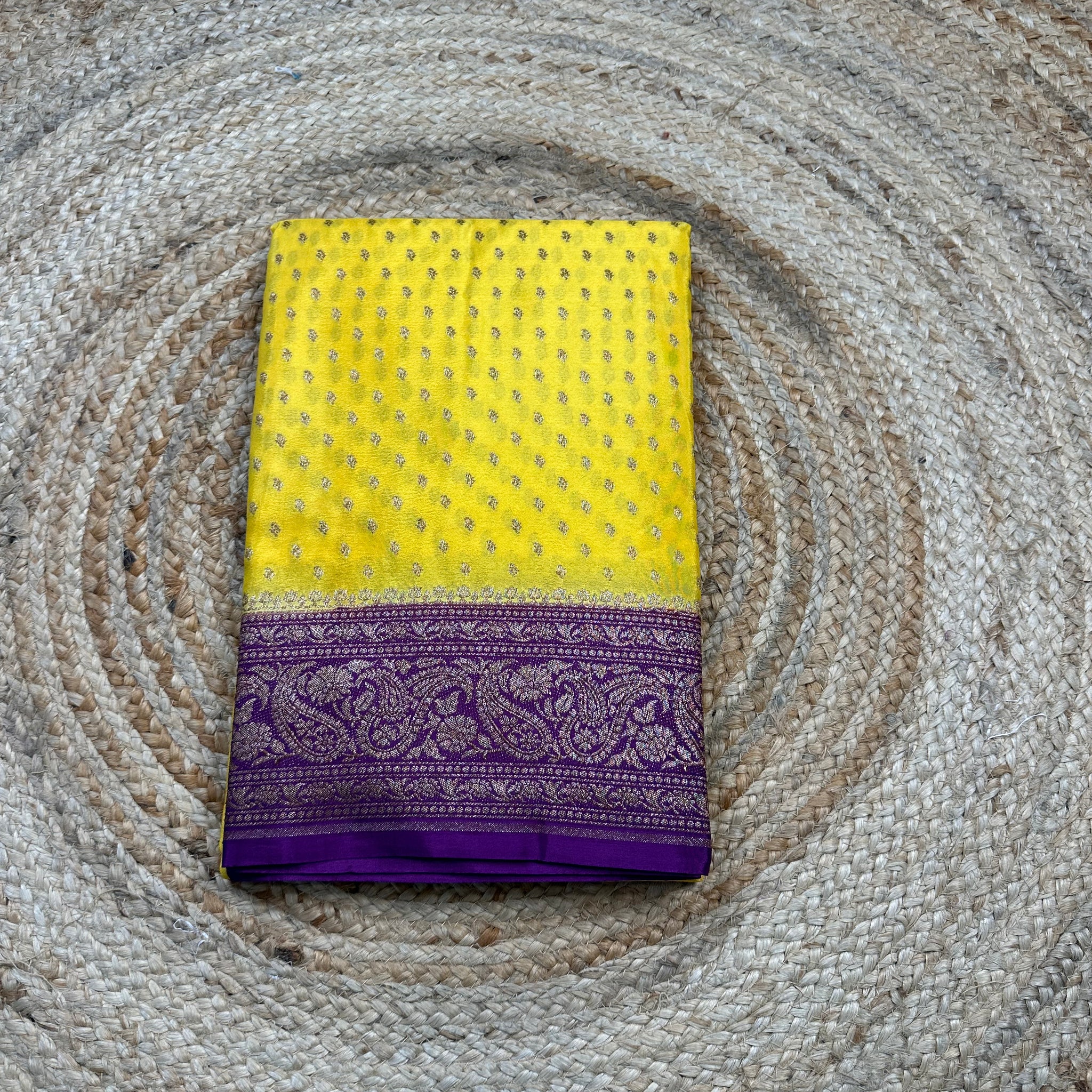 Yellow and violet crepe chiffon sarees.