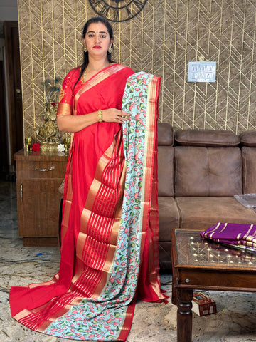 Semi Mysore Silk crepe. Red border with floral prints.