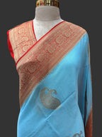Sky blue  n orange mango butta georgette saree (SG107)