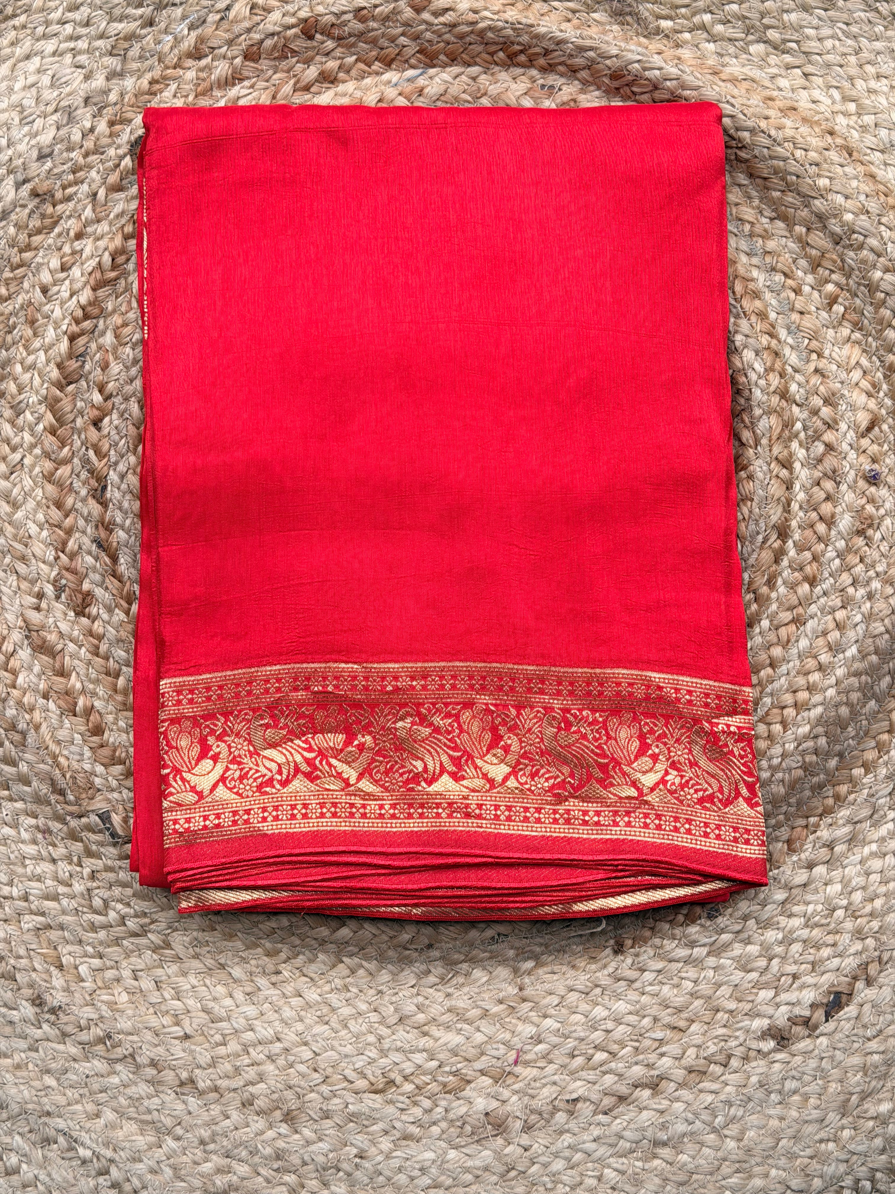 Red plain dola modal saree with meenaweaving.