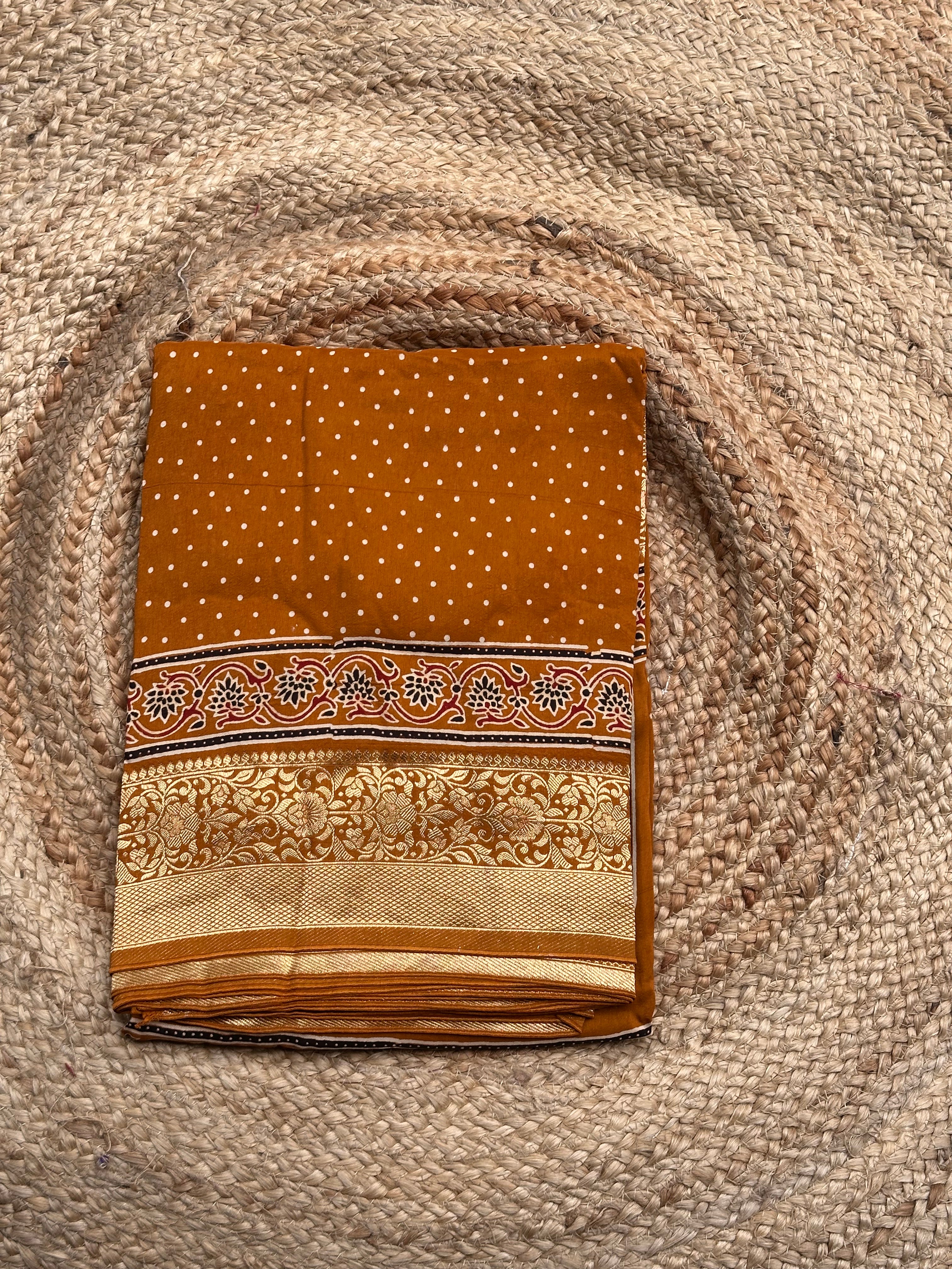 Mustard Ajrak dola silk sarees