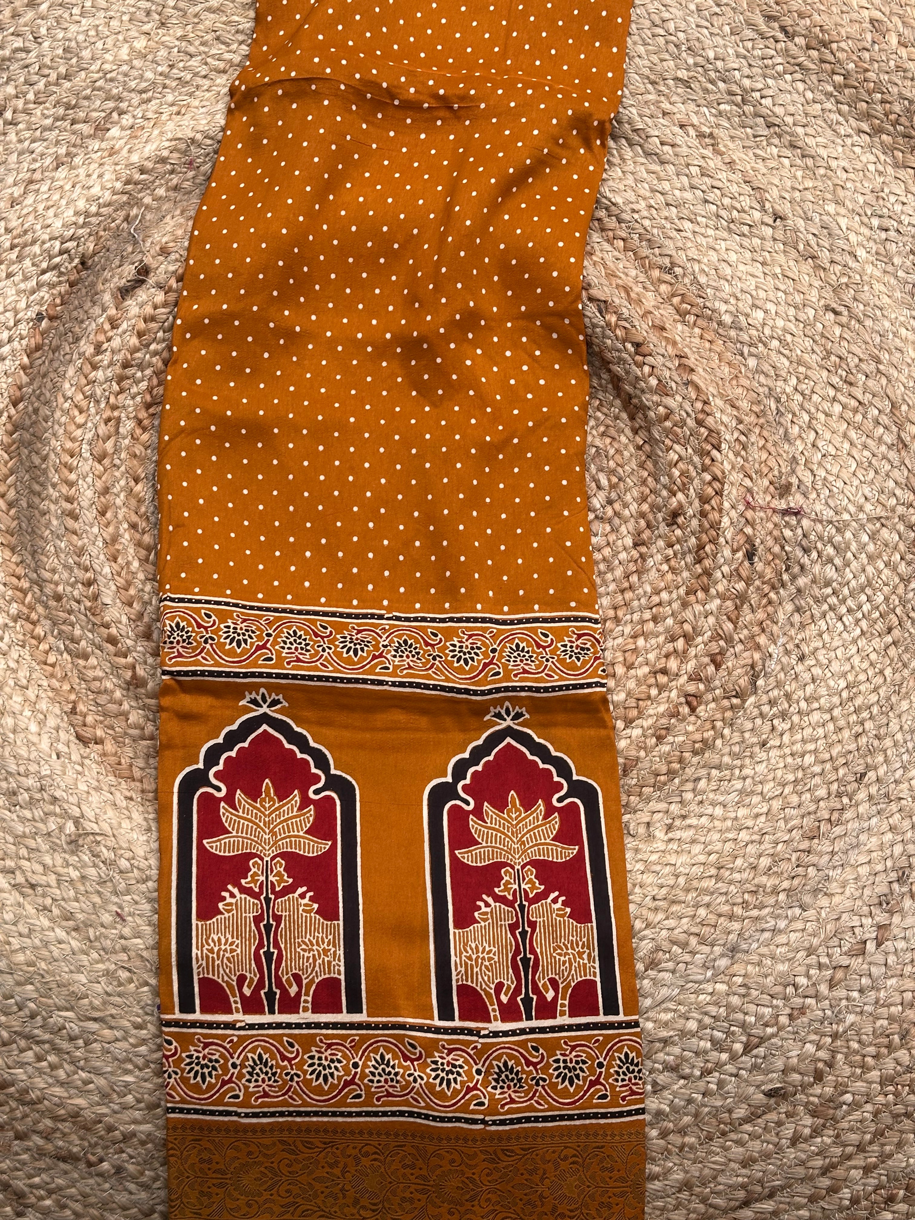 Mustard Ajrak dola silk sarees