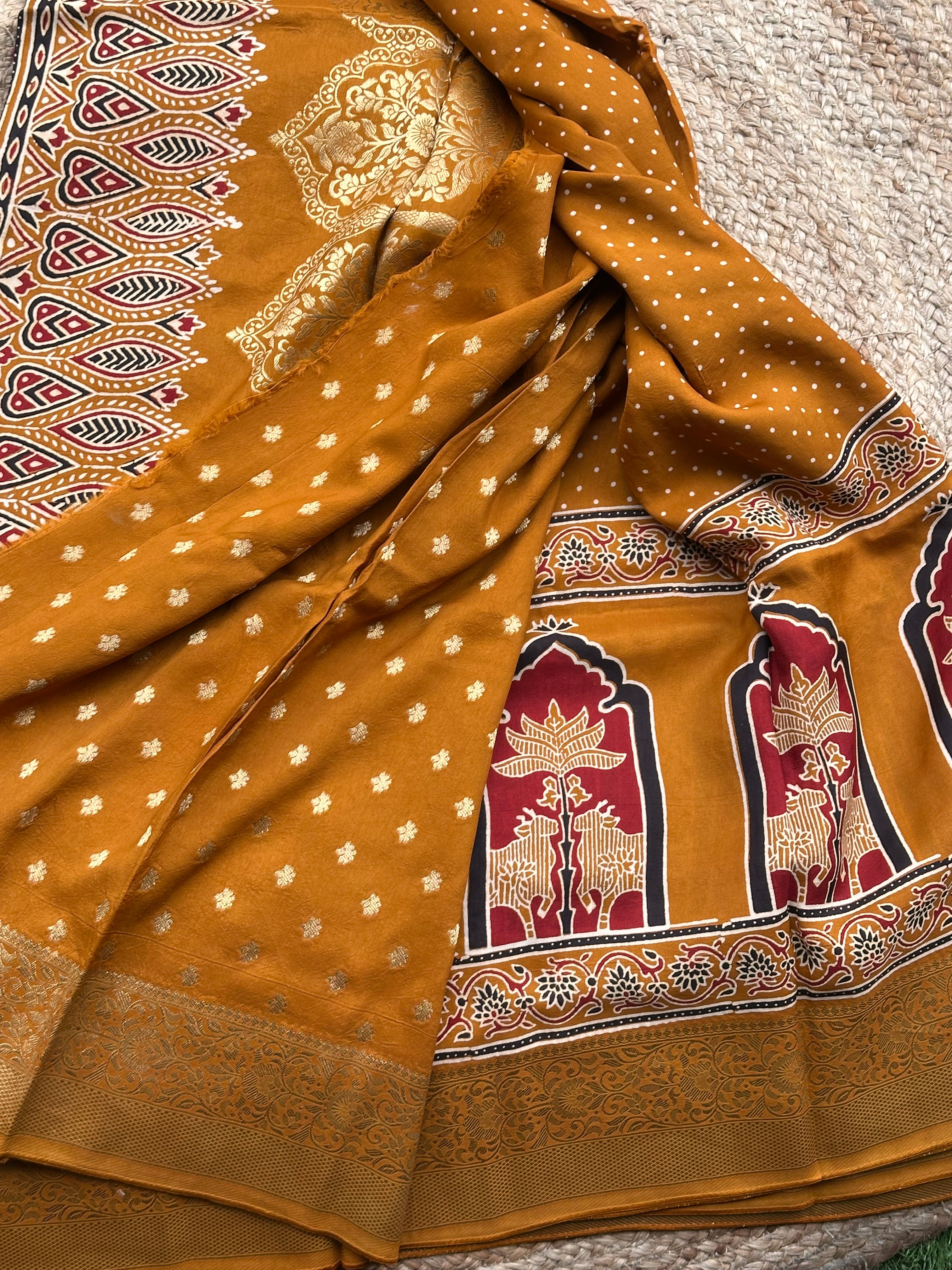 Mustard Ajrak dola silk sarees