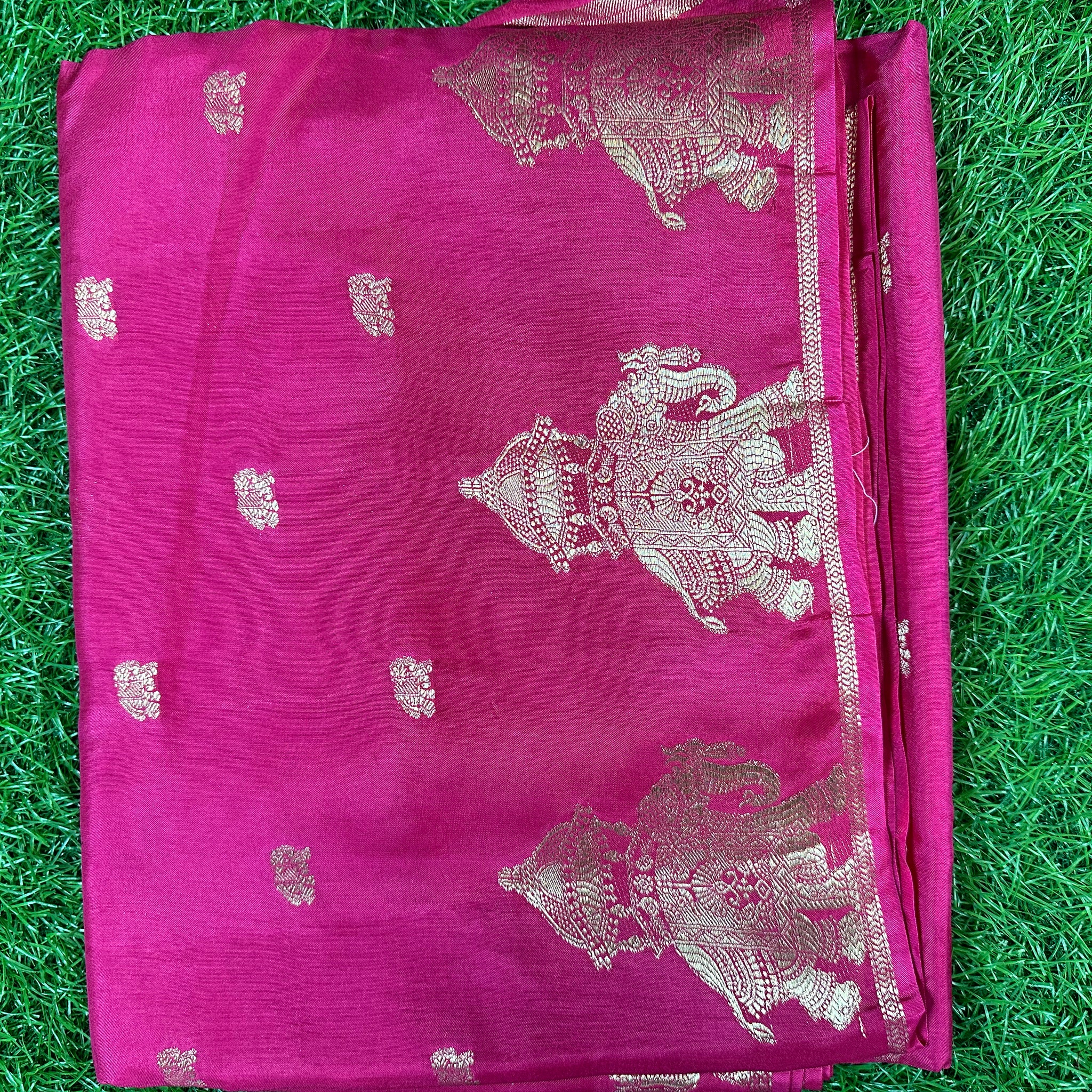 Dola silk in elephant border in pink colour