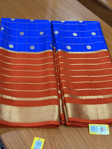 Royal blue and rust orange pure crepe Mysore silk sarees