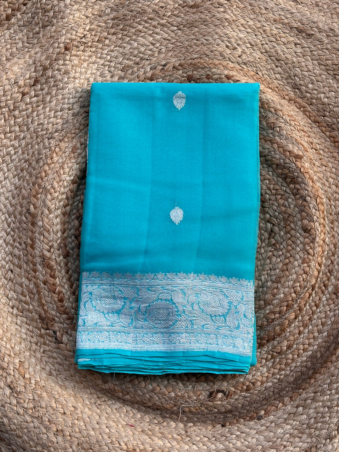Sky blue pure khaddi chiffon silver zari woven sarees