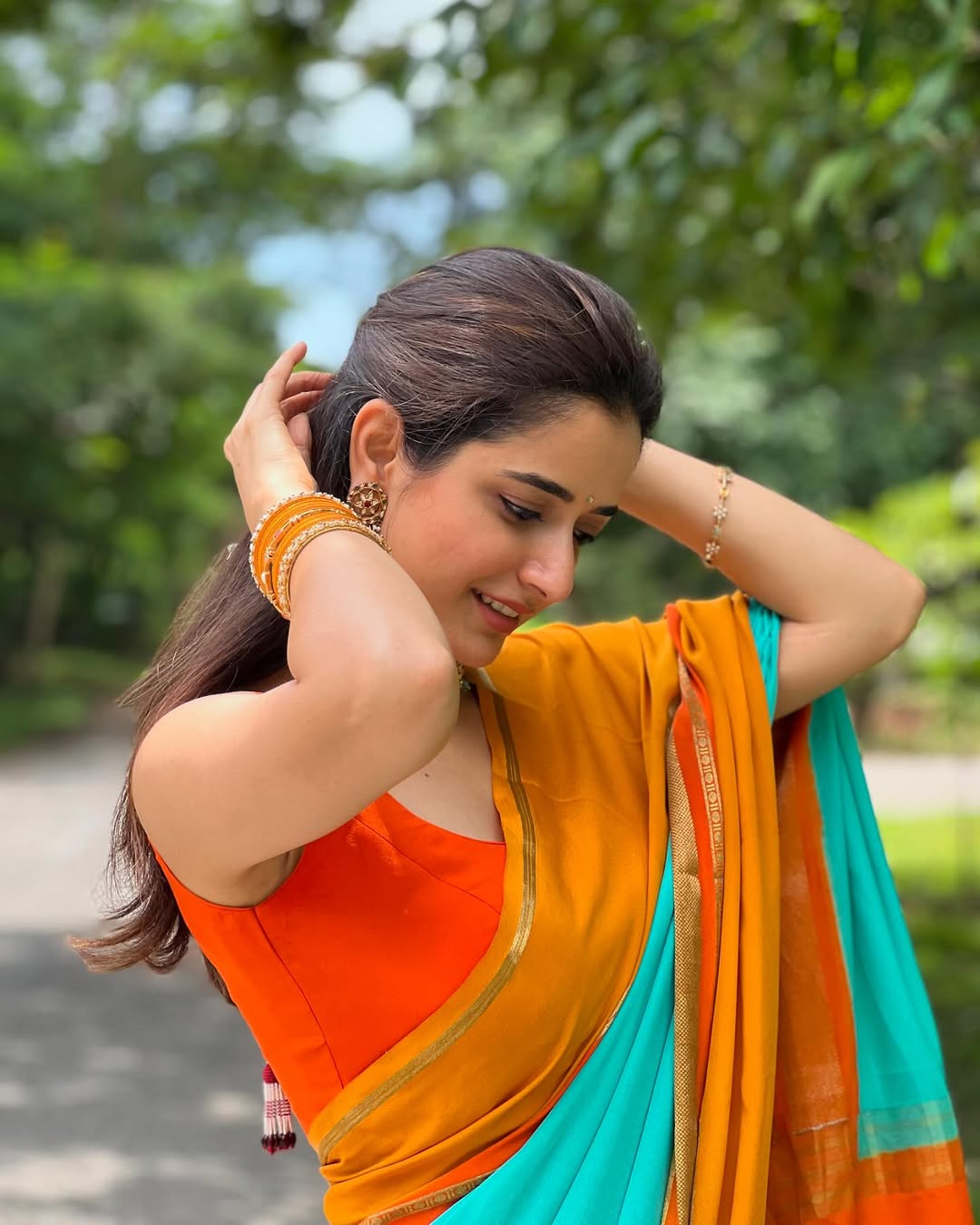 Ashika Pure crepe Mysore Silk 3d pattern teal blue and orange and mustard
