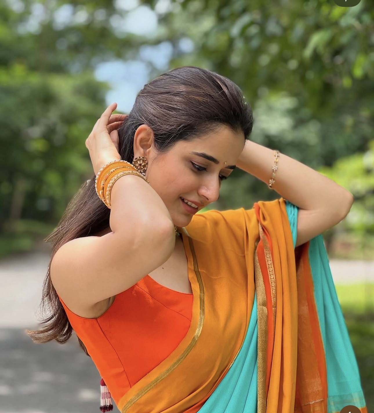 Ashika Pure crepe Mysore Silk 3d pattern teal blue and orange and mustard