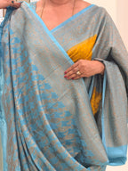 Musturd yellow and sea blue Banarasi crepe chiffon with jaal blouse