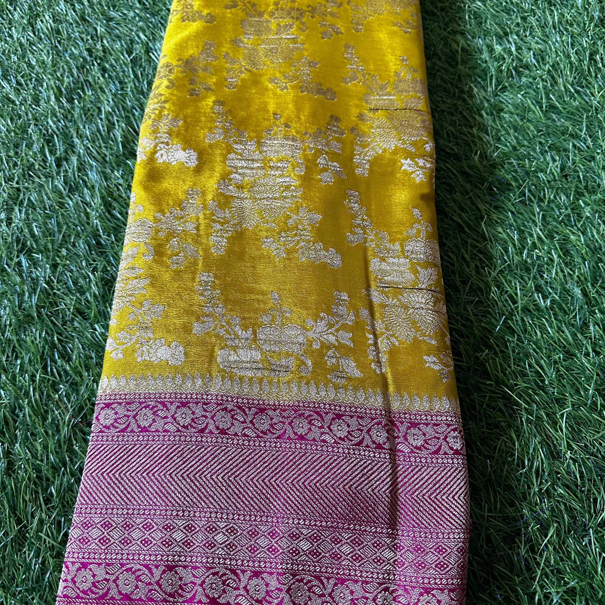 Crushed georgette in jaal pattern.lemon yellow with pink combination.